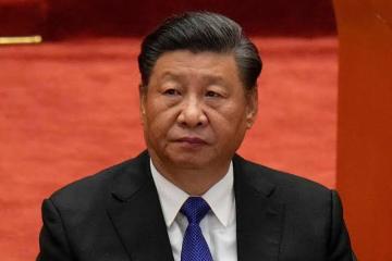 Xi