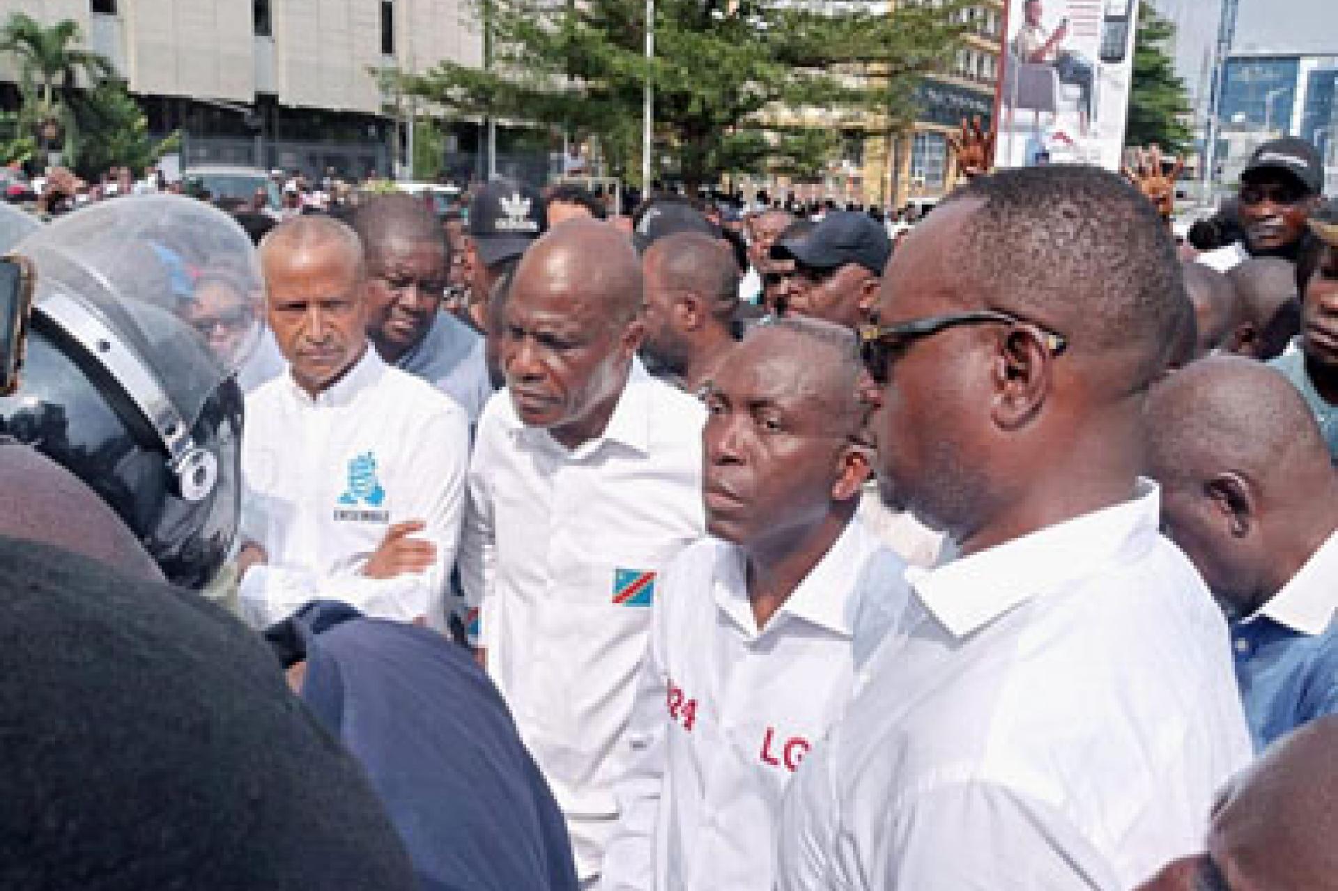 Katumbi, Fayulu, Matata et Sessanga lors d'une marche pacifique sur le boulevard du 30 juin à Kinshasa. 