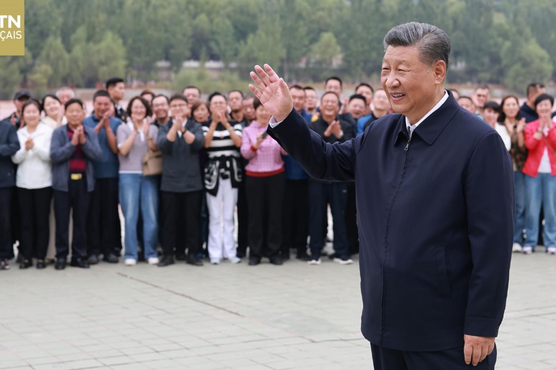 Xi
